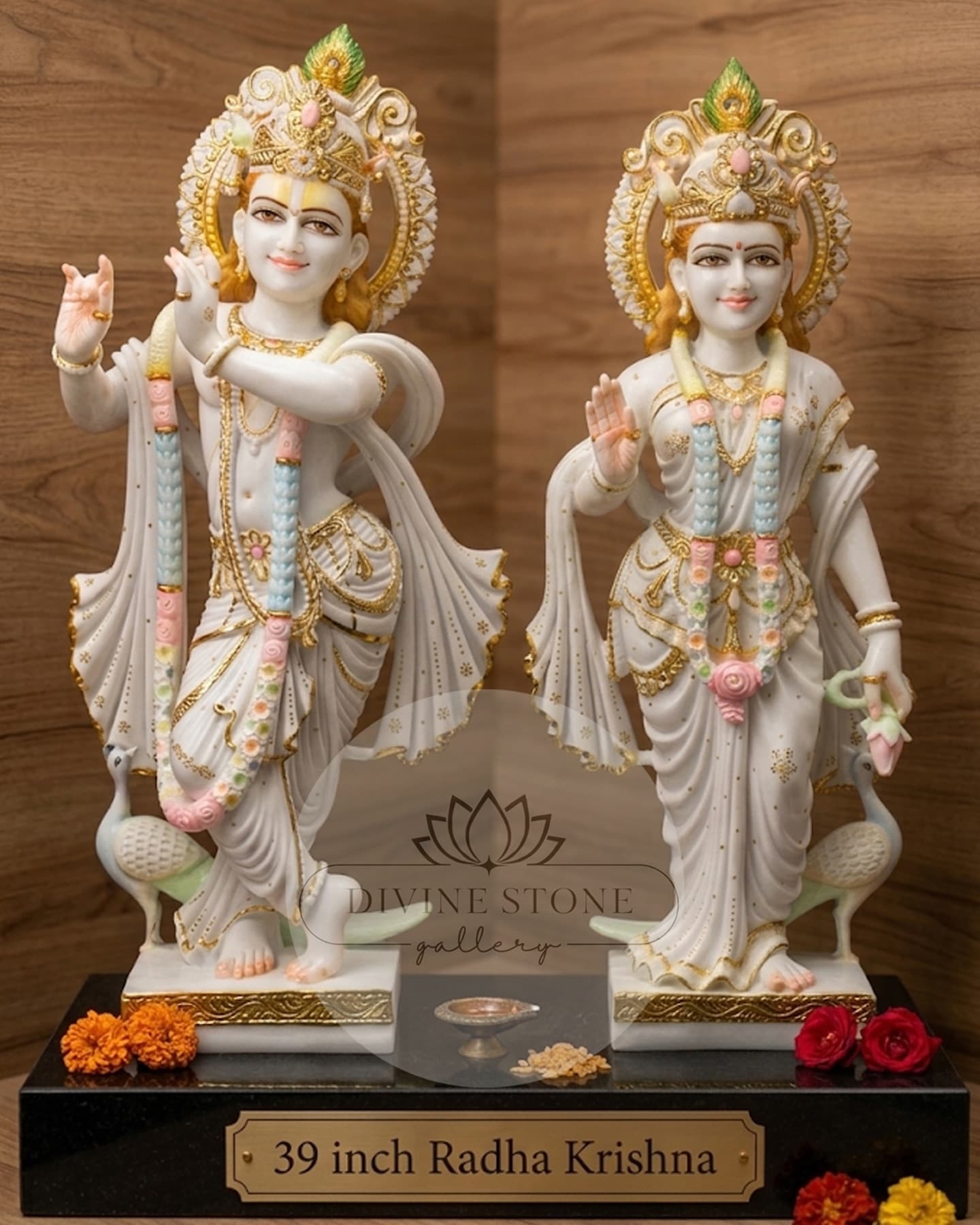 Hand-carved Radha Krishna marble moorties with gold and pastel detailing